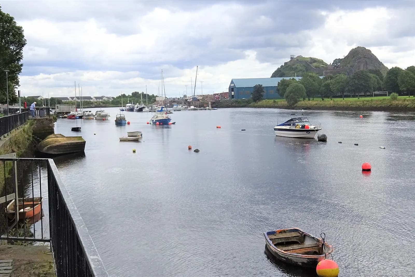 Small boats on the River Leven at Dumbarton, with Dumbarton Rock and its castle beyond