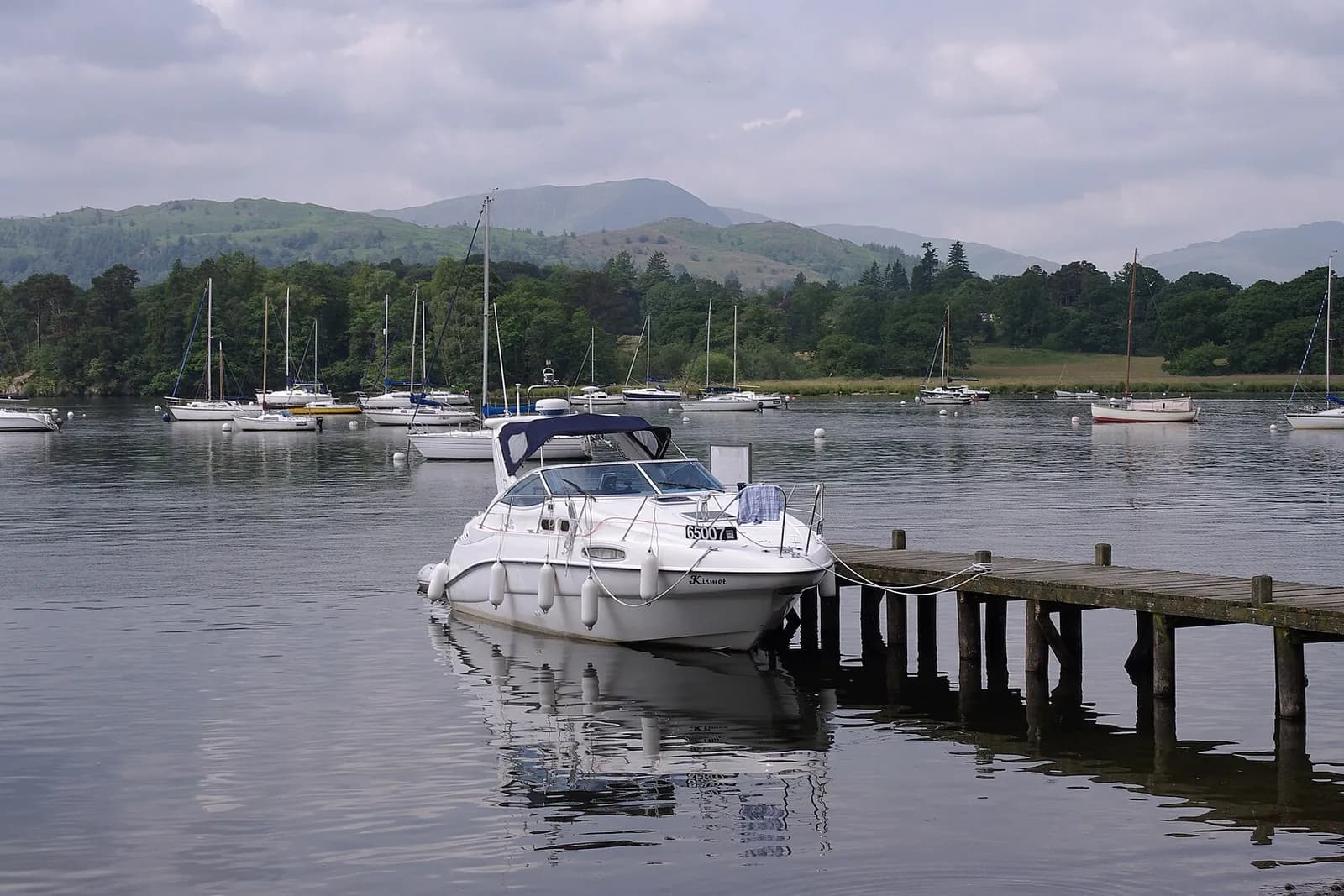 Boats moored at Waterhead on Windermere, with the fells beyond