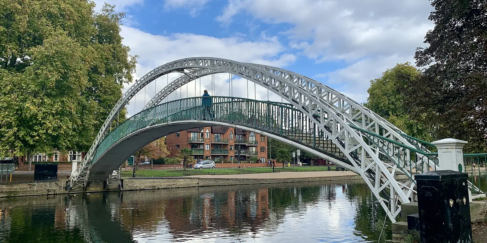 The white and green arched suspension bridge over the River Great Ouse in Bedford