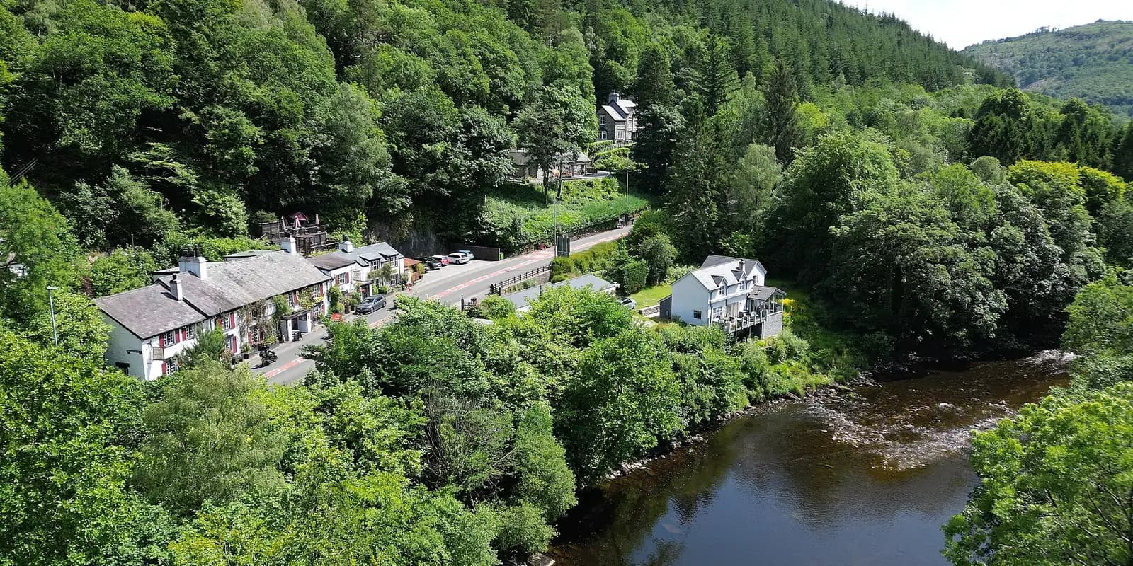 Wooded hills and the River Llugwy at Betws-y-Coed, seen from the air