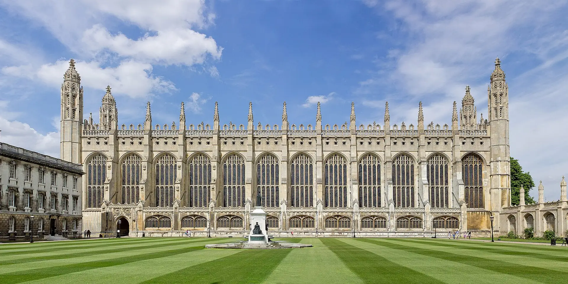 King's College Chapel in Cambridge, its tall Gothic windows and pinnacles above a striped lawn