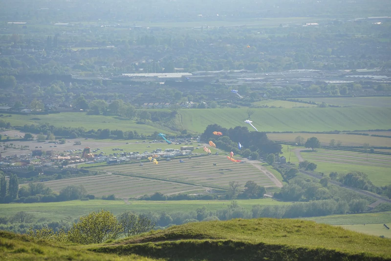 Cheltenham Racecourse and the Severn Vale spread out below the slopes of Cleeve Hill
