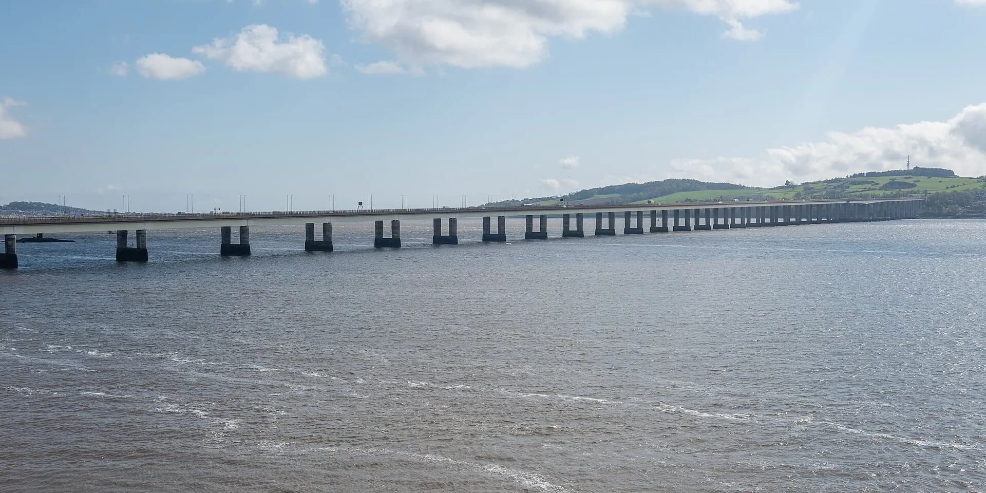 The long Tay Road Bridge stretching across the wide River Tay from Dundee