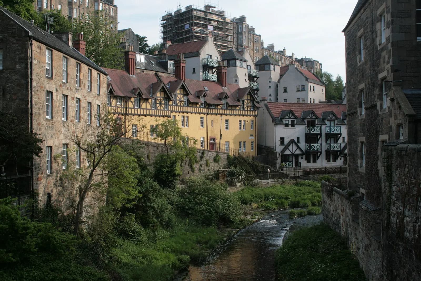 Old stone and timbered buildings of Dean Village above the Water of Leith