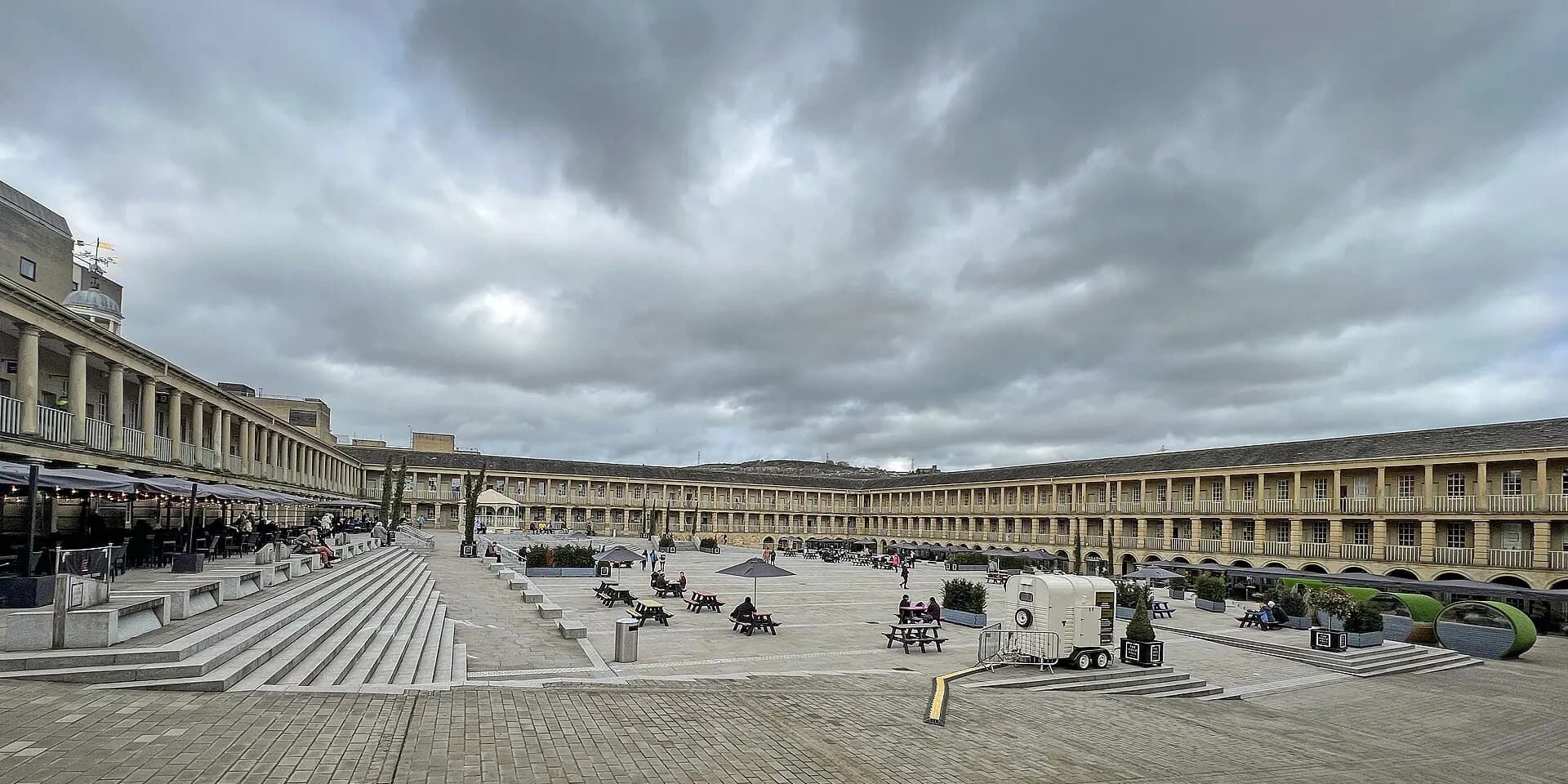 The Piece Hall in Halifax: a vast open square surrounded by tiers of stone colonnades
