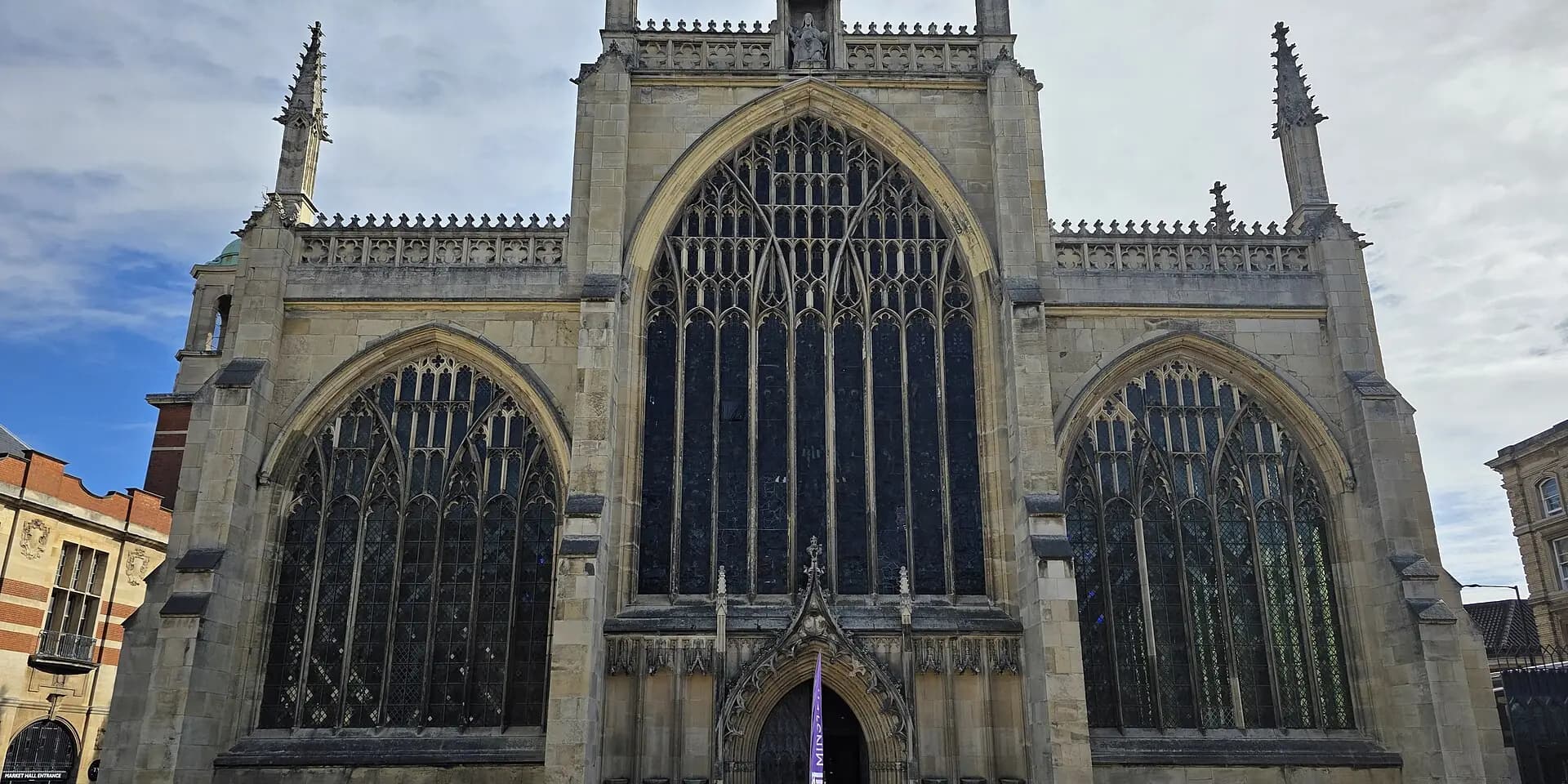 The great west front of Hull Minster, with its tall traceried windows and pinnacles