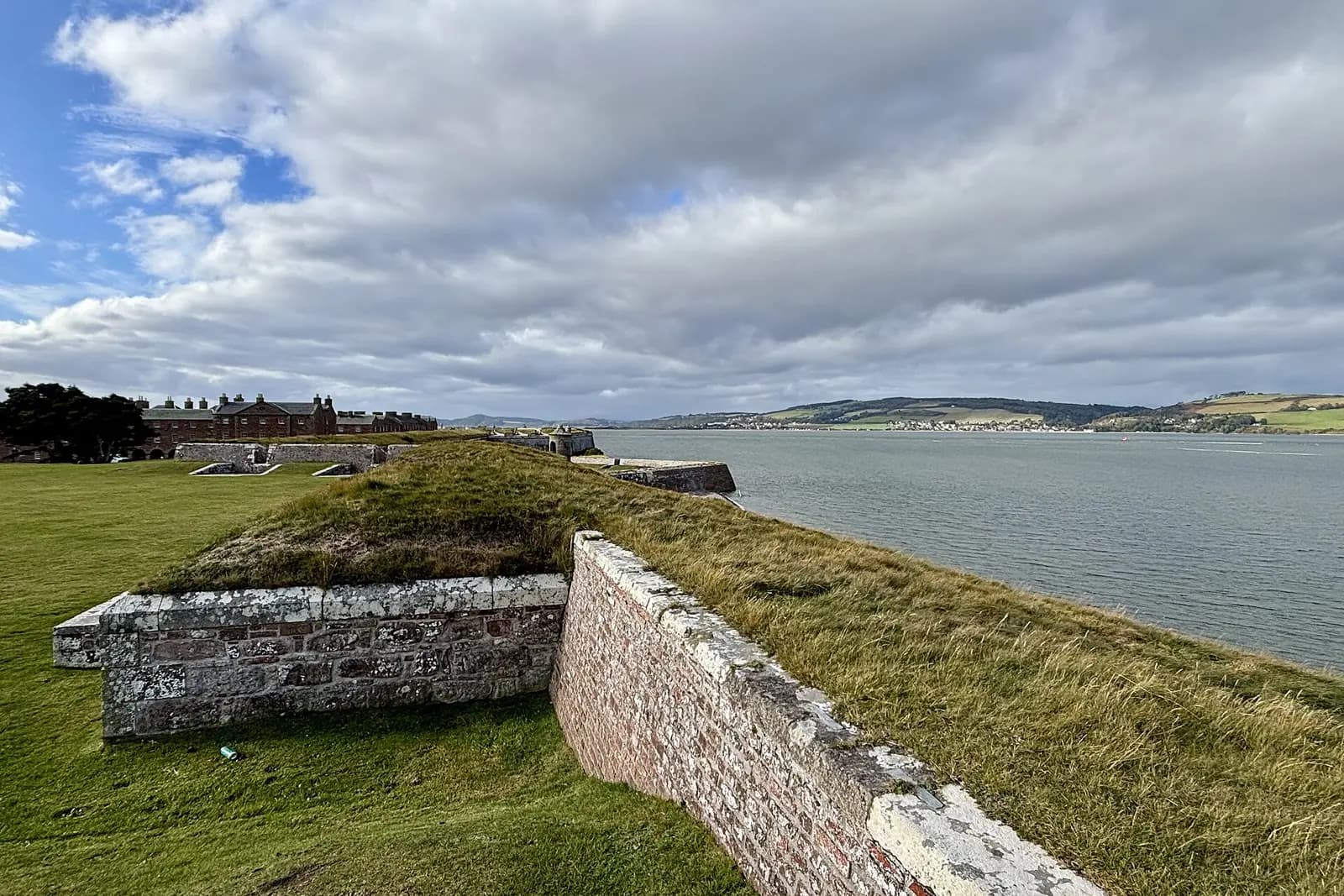 The grassy ramparts of Fort George looking out over the Moray Firth