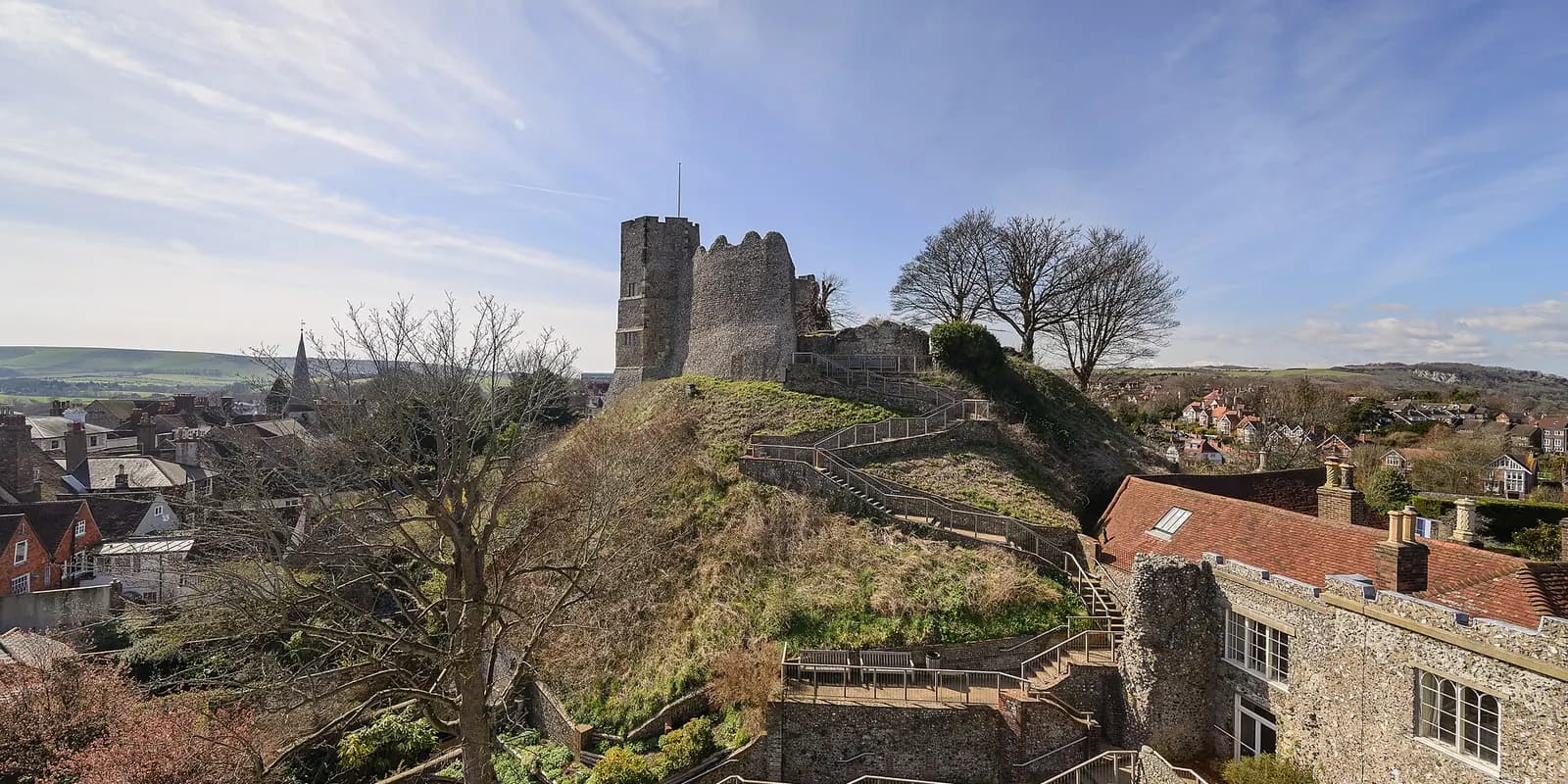 Lewes Castle's keep on its mound above the town's rooftops, with the South Downs beyond