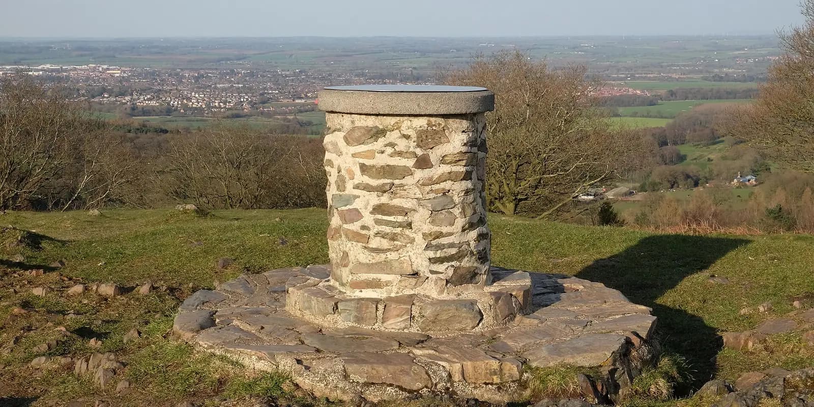 The stone toposcope on top of Beacon Hill, with the countryside around Loughborough below