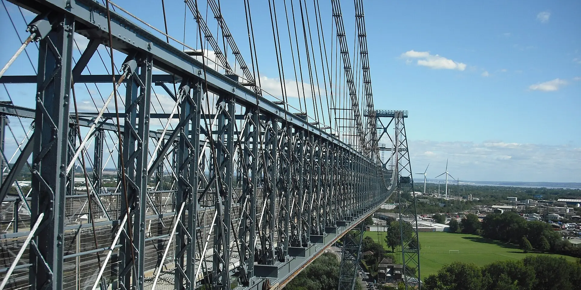 The steel lattice girders of the Newport Transporter Bridge high above the town