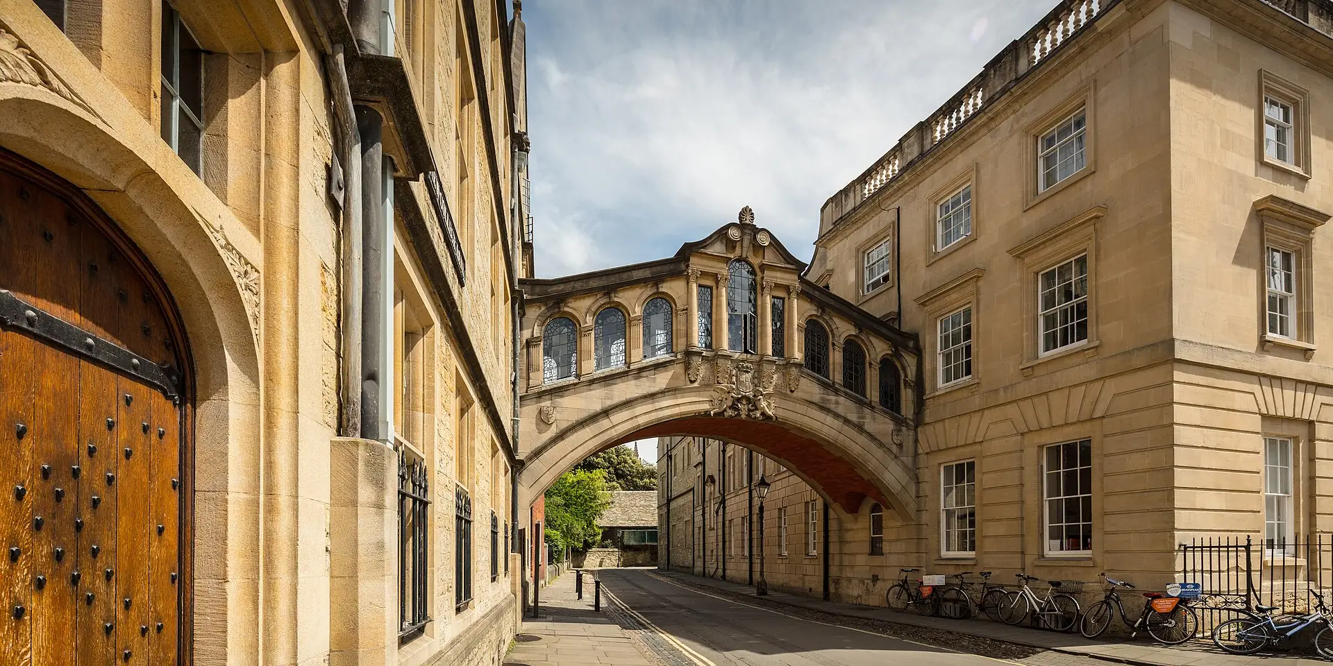 The Bridge of Sighs, an enclosed stone bridge between college buildings over a quiet Oxford lane