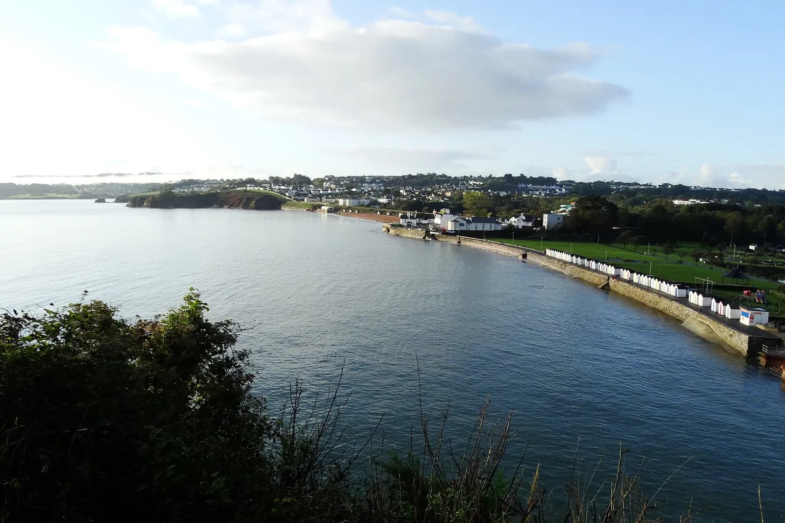 Goodrington Sands curving along the bay, seen from Roundham Head