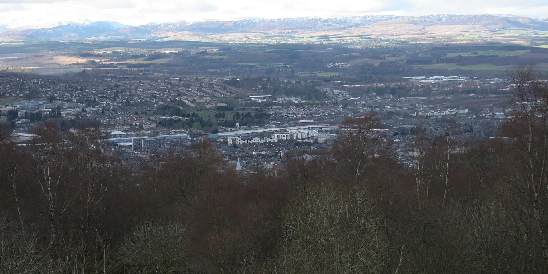Perth spread out below Kinnoull Hill, with snowy Highland mountains on the horizon