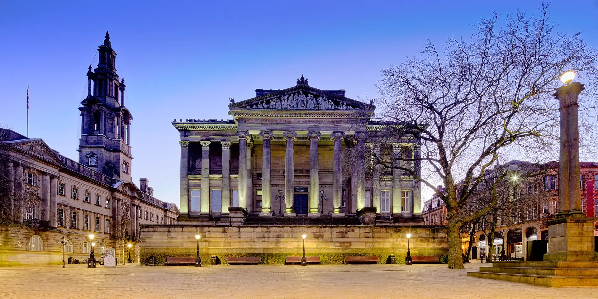 The Harris Museum's columned front and Preston's town hall tower, lit up at dusk