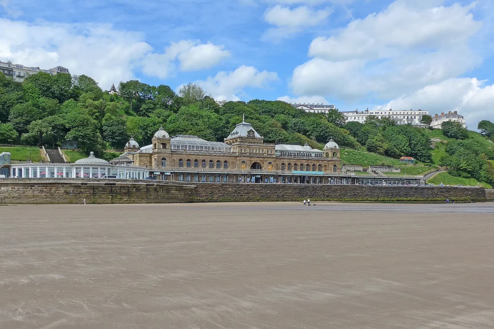 Scarborough Spa's Victorian buildings along the seafront below wooded cliffs