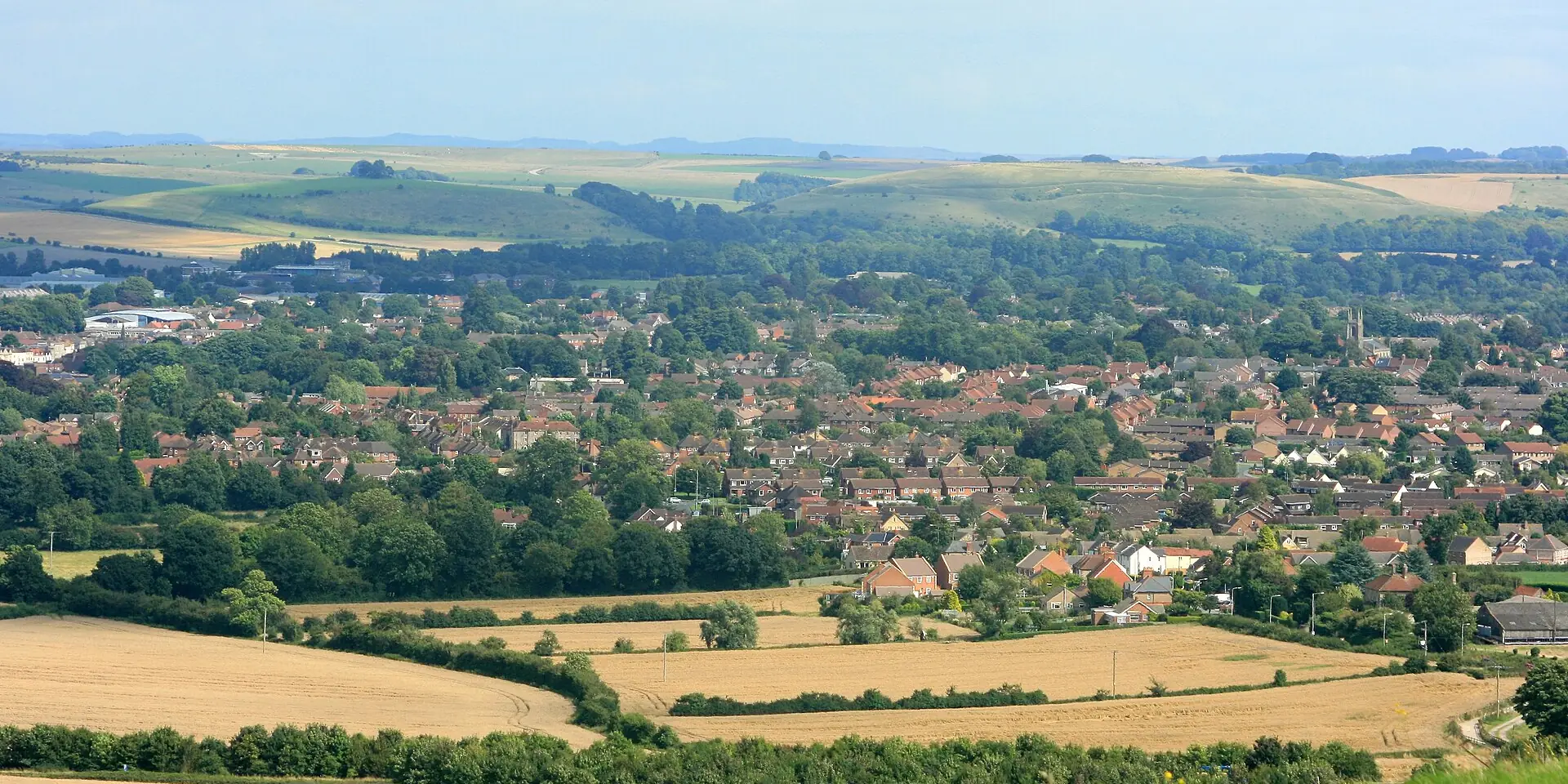 Warminster spread below Cley Hill, with fields and the downs beyond