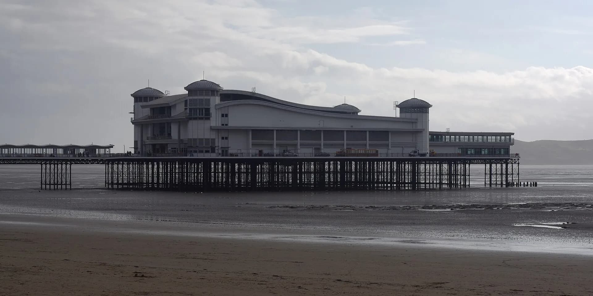Weston-super-Mare's Grand Pier and its pavilion standing over the sands