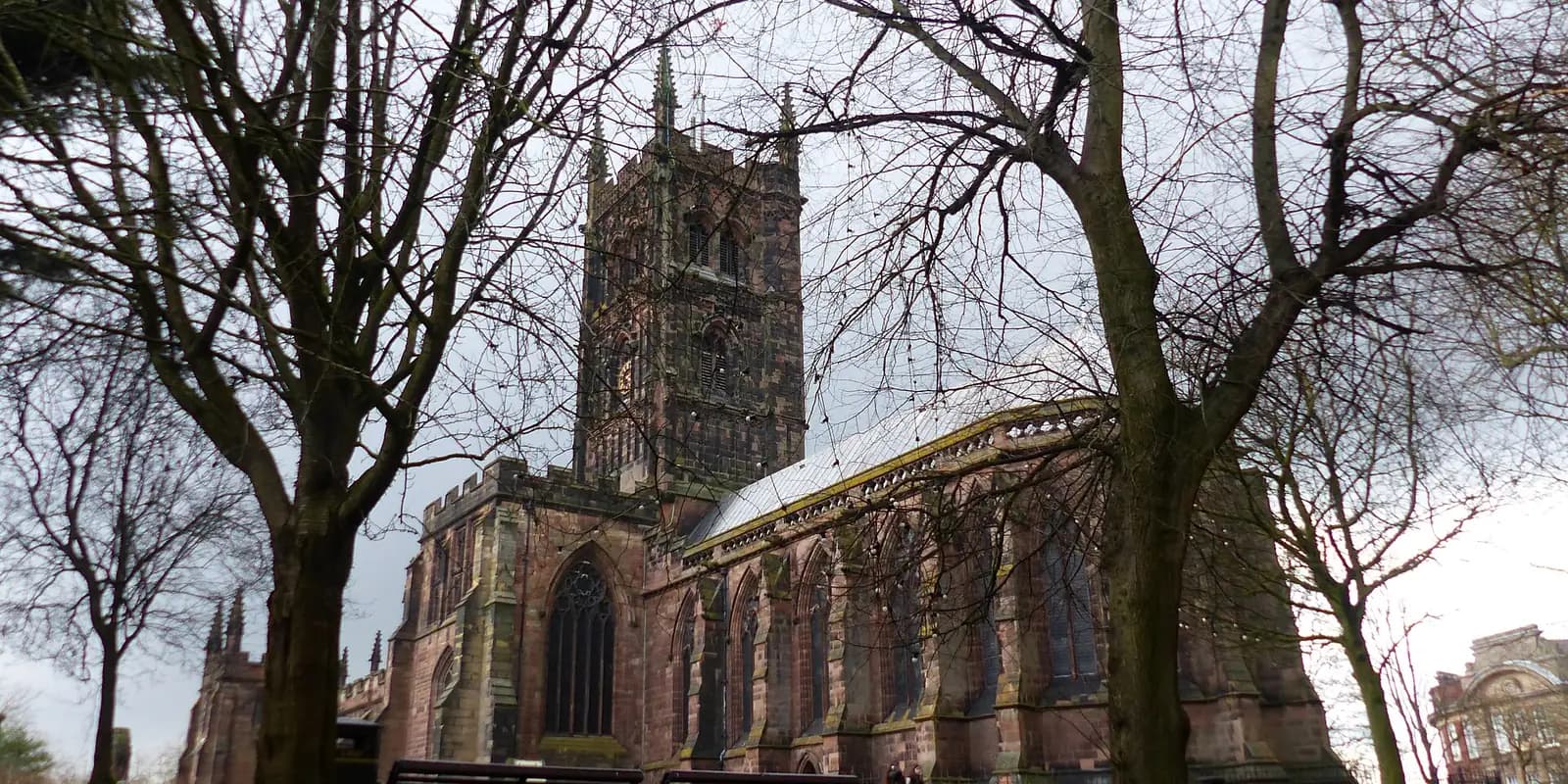 St Peter's Collegiate Church in Wolverhampton, its sandstone tower framed by bare trees