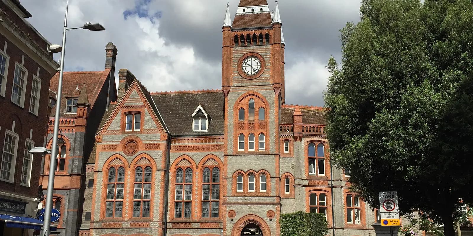 Reading's Victorian Town Hall, a red-brick building with a clock tower and pointed windows