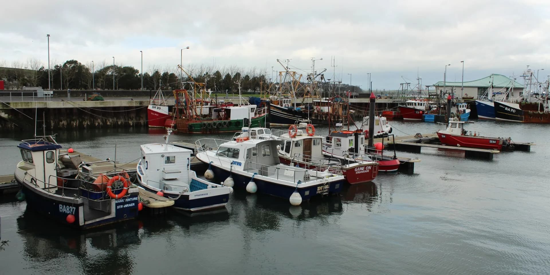 Small fishing boats moored in Stranraer harbour