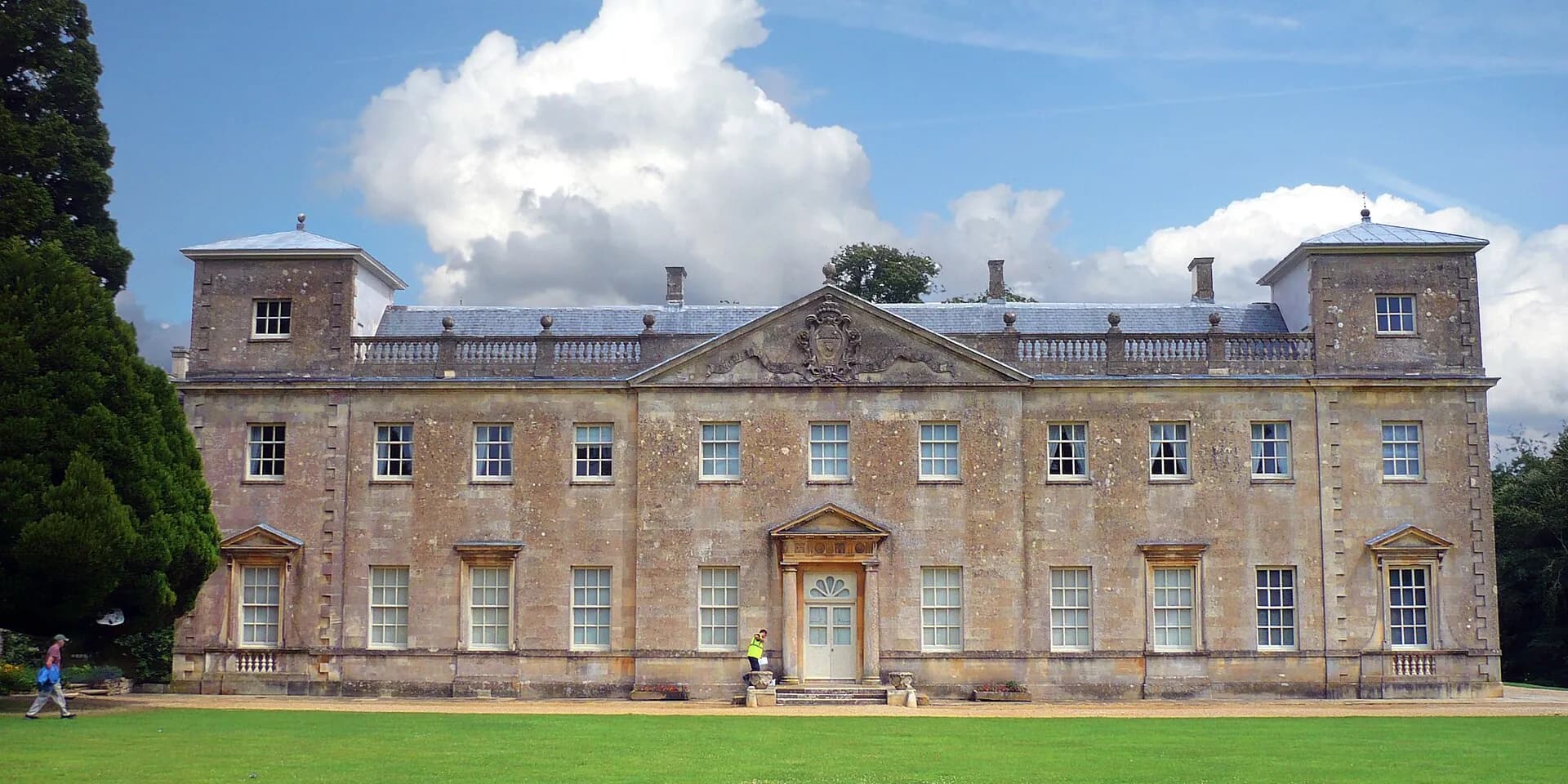 Lydiard House, a Palladian country house, above a green lawn in Lydiard Park