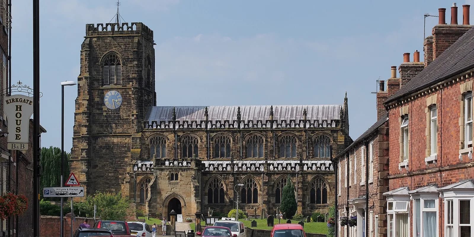 St Mary's Church in Thirsk, a Gothic church with a tall tower, at the end of Kirkgate
