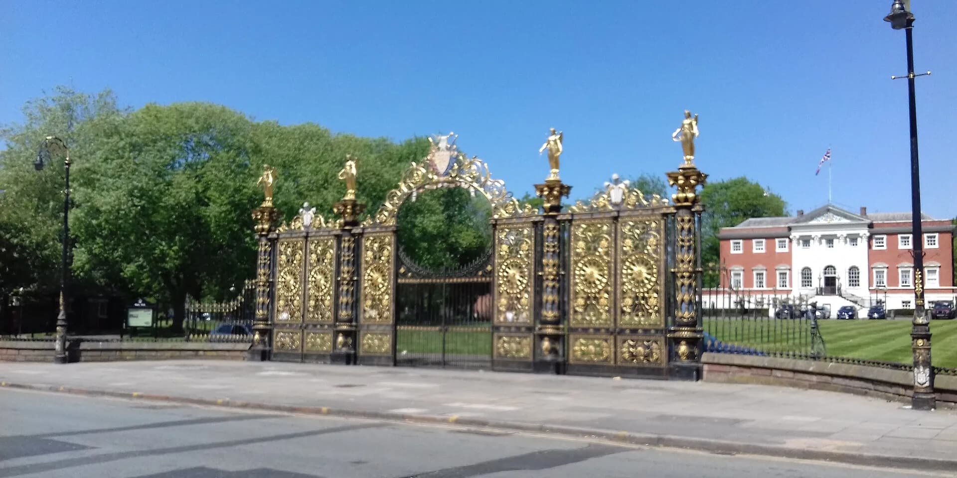 The ornate golden gates in front of Warrington Town Hall